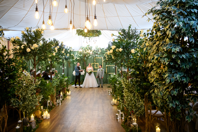 couple centre of aisle long shot at B Corp farm wedding venue features on Channel 5 Rich Wedding Poor Wedding 3rd May 2026 9pm