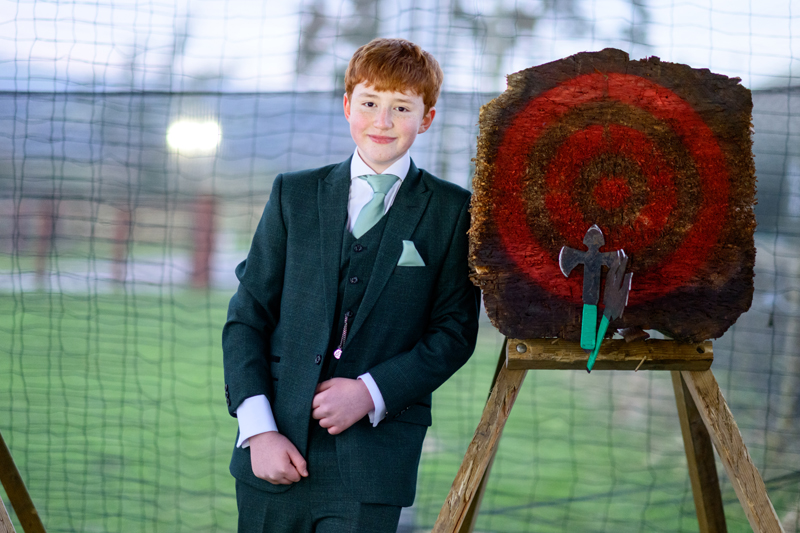 boy leaning against axe target at B Corp farm wedding venue features on Channel 5 Rich Wedding Poor Wedding 3rd May 2026 9pm
